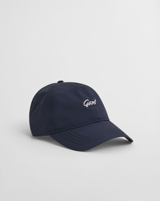 Cap in Crinkle-Optik mit kleiner Grafik