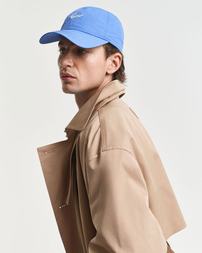 Cap in Crinkle-Optik mit kleiner Grafik